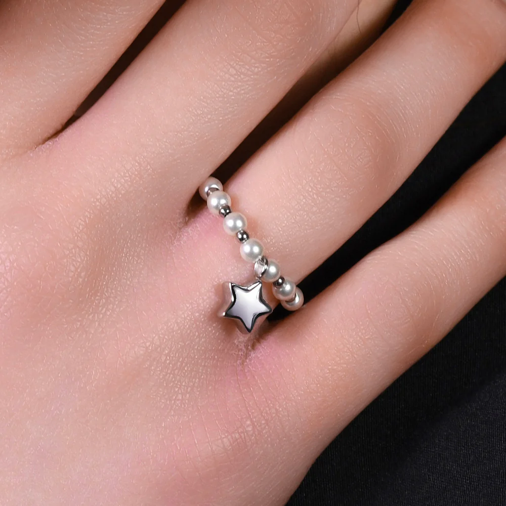 ANELLO DONNA IN ACCIAIO E PERLE SINTETICHE BIANCHE CON STELLA - Image 2