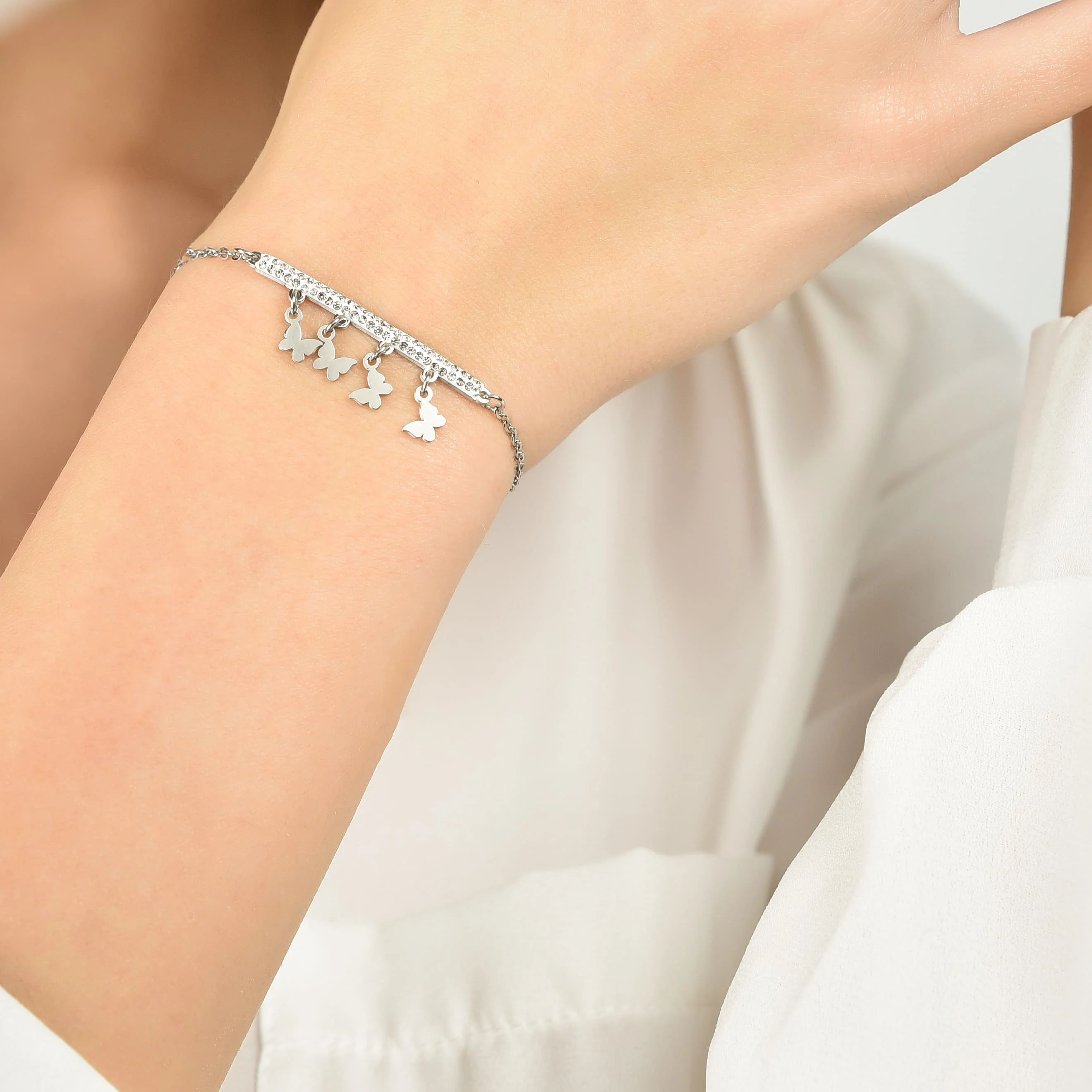 BRACCIALE DONNA IN ACCIAIO CON CIONDOLI FARFALLE - Image 2