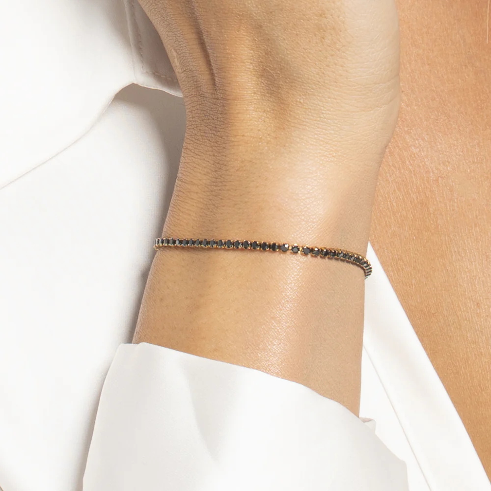 BRACCIALE TENNIS DONNA IN ACCIAIO COLORE ORO CON ZIRCONI NERI - Image 2