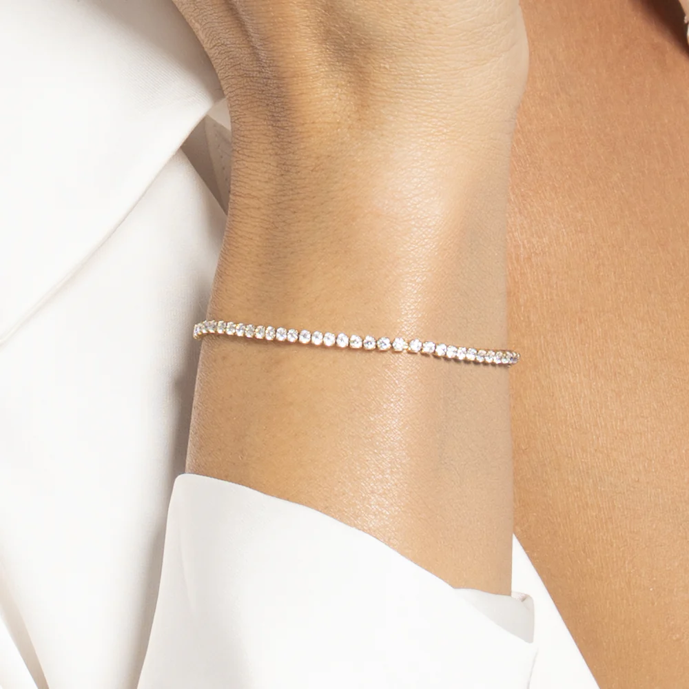 BRACCIALE TENNIS DONNA IN ACCIAIO CON ZIRCONI BIANCHI COLORE ORO - Image 2